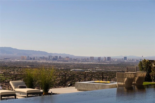 view of pool with a mountain view