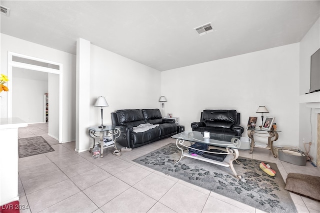 living room featuring light tile patterned floors