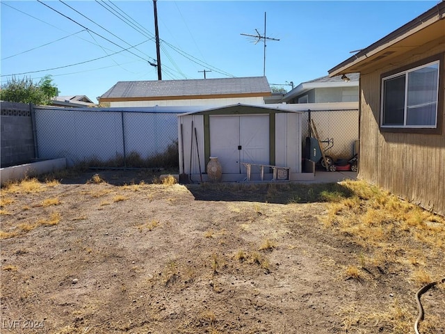 exterior space with a fenced backyard