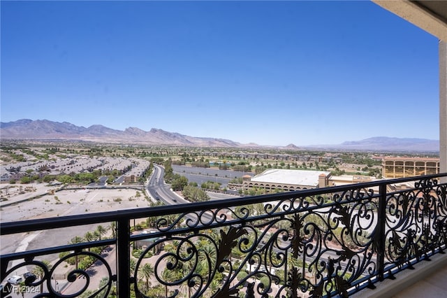 balcony featuring a mountain view