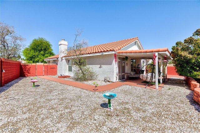 view of front of property featuring a patio area