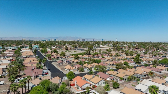 drone / aerial view featuring a mountain view