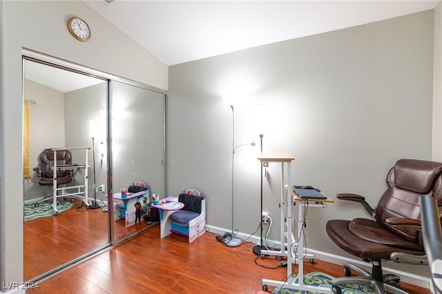 office area with lofted ceiling and hardwood / wood-style flooring