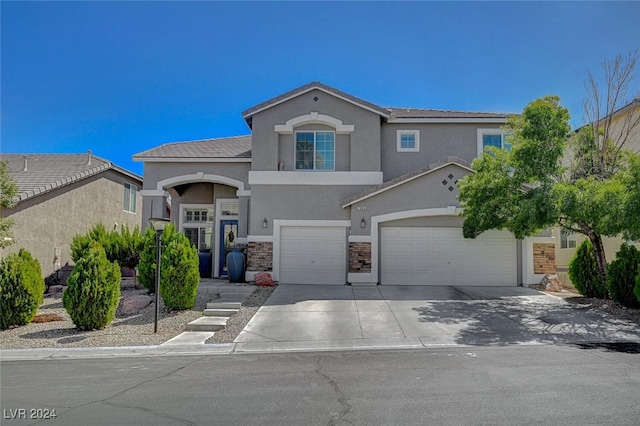 view of front of home with a garage