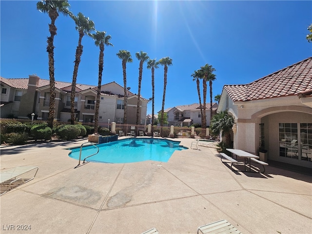 view of pool with a patio area