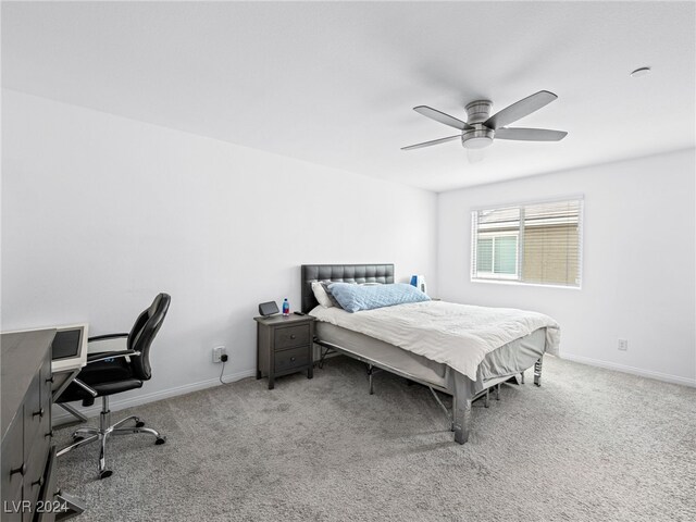 bedroom with ceiling fan and carpet floors