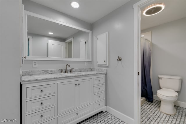 bathroom featuring walk in shower, tile patterned flooring, vanity, and toilet