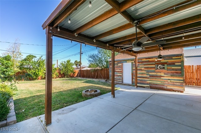 view of patio / terrace with an outdoor fire pit