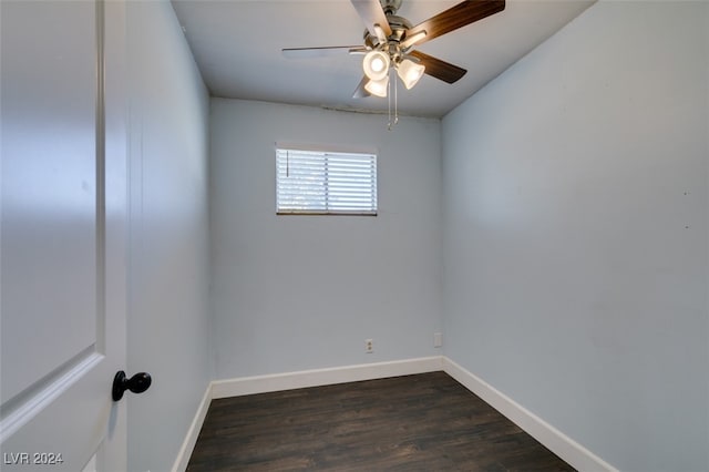 unfurnished room featuring ceiling fan and dark hardwood / wood-style floors