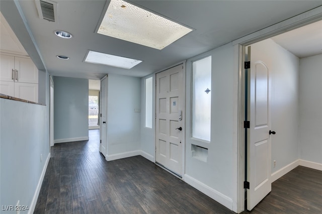 foyer entrance with dark hardwood / wood-style flooring