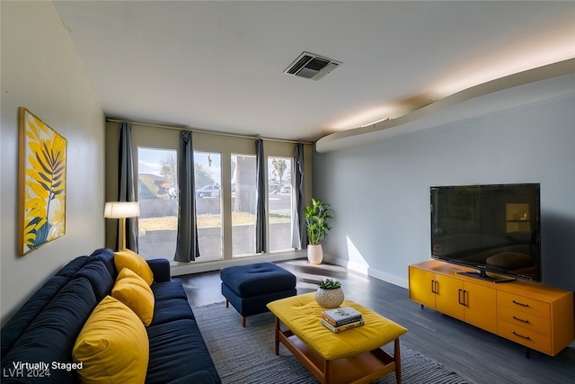 living room featuring dark hardwood / wood-style floors