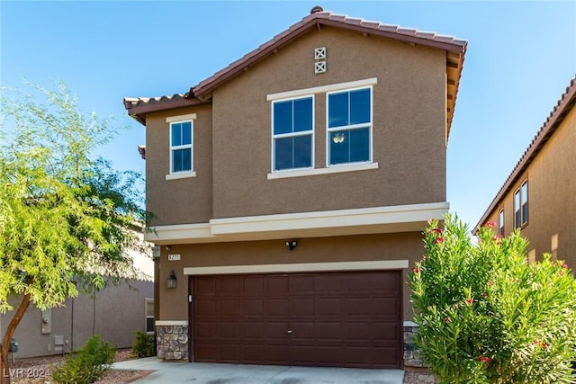 view of front of property featuring a garage