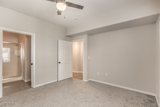 unfurnished bedroom featuring ceiling fan and carpet floors