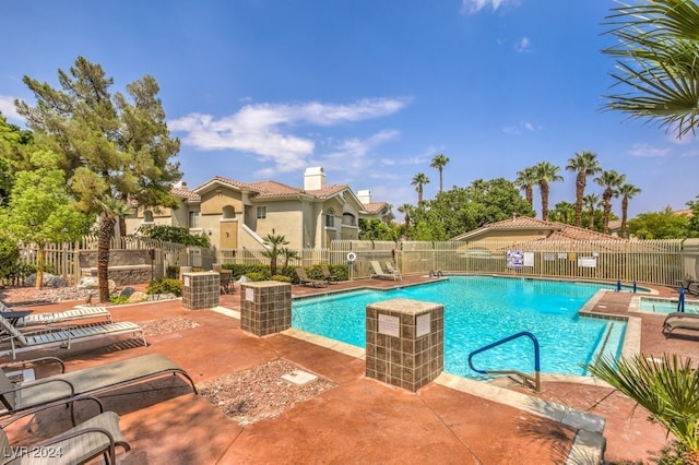 view of pool featuring a patio