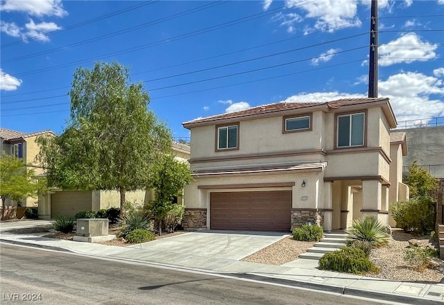 view of front of home with a garage