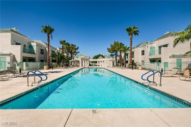 view of swimming pool featuring a patio