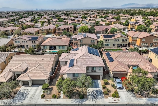 drone / aerial view featuring a mountain view