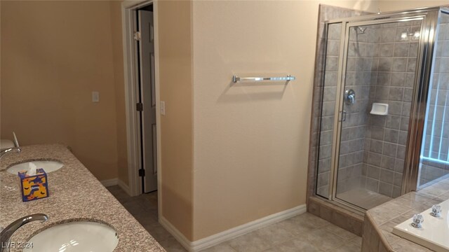 bathroom featuring vanity, separate shower and tub, and tile patterned flooring