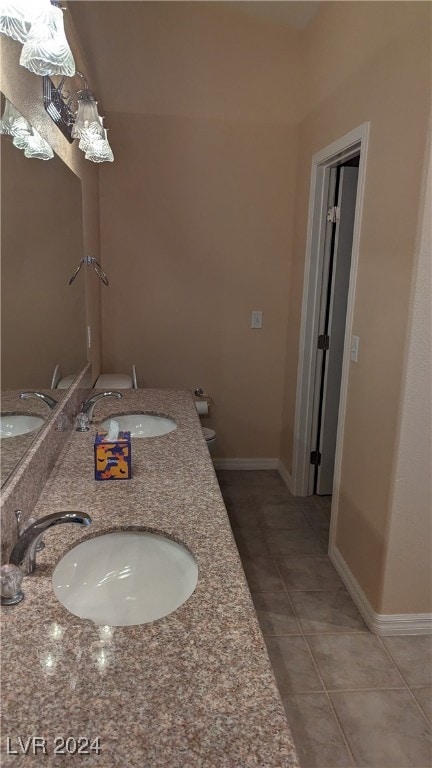 bathroom with vanity and tile patterned floors