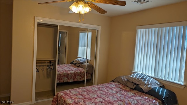 bedroom featuring a closet and ceiling fan