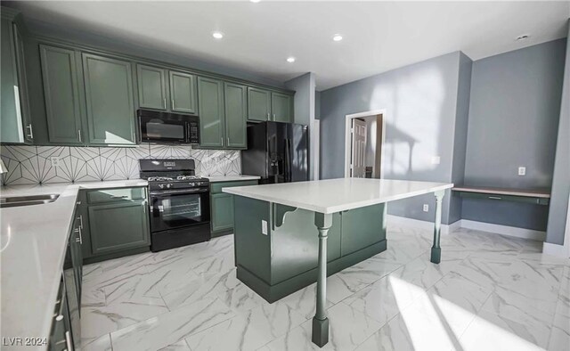 kitchen featuring a kitchen island, black appliances, backsplash, green cabinets, and a kitchen bar