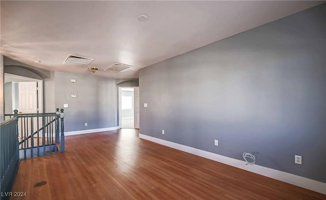 empty room featuring wood-type flooring