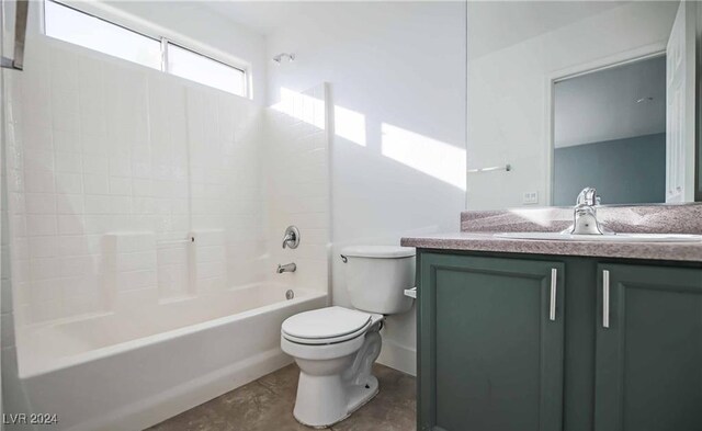 full bathroom featuring toilet, bathing tub / shower combination, and vanity