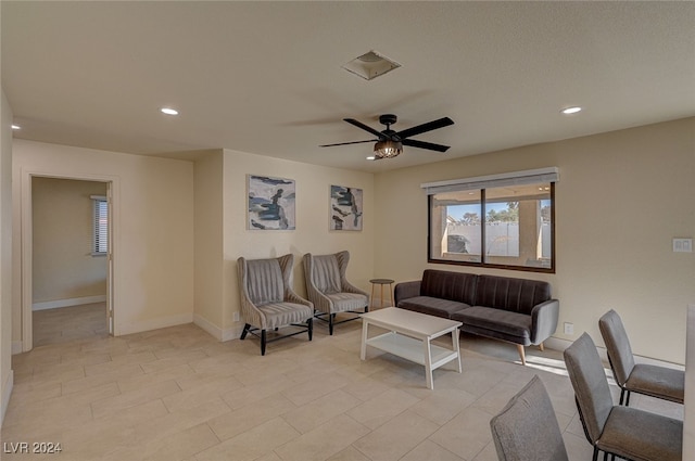 living room with ceiling fan