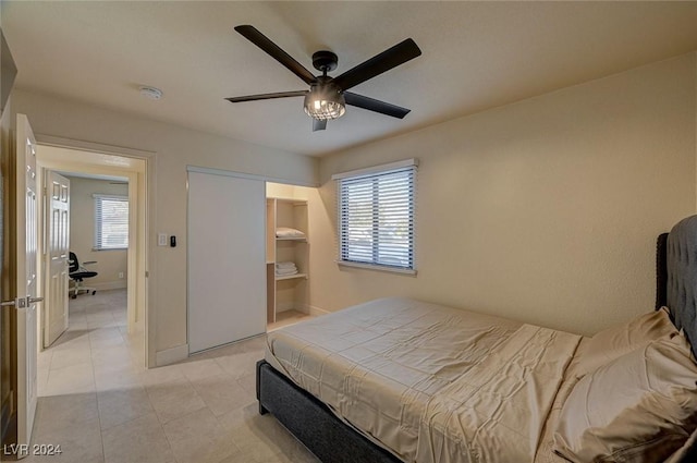 4729 Bennett Dr, Las Vegas, NV 89121 - bedroom with ceiling fan, baseboards, and light tile patterned floors