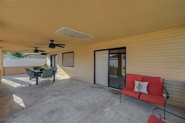 view of patio / terrace featuring ceiling fan