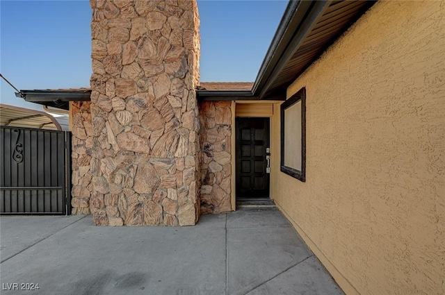 4729 Bennett Dr, Las Vegas, NV 89121 - view of side of property with stone siding and stucco siding