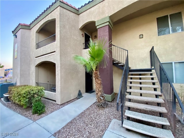 view of property exterior featuring a balcony