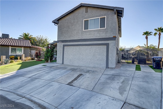 exterior space with a garage