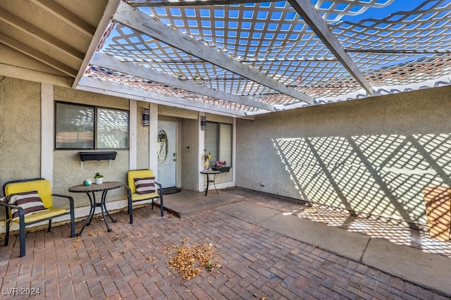 view of patio featuring a pergola