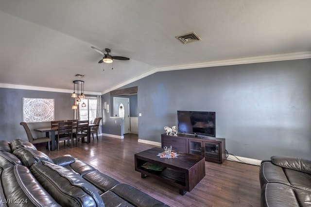 living room with ornamental molding, vaulted ceiling, ceiling fan, and dark hardwood / wood-style floors