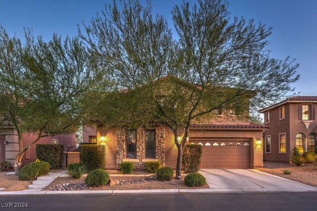 view of front of property featuring a garage