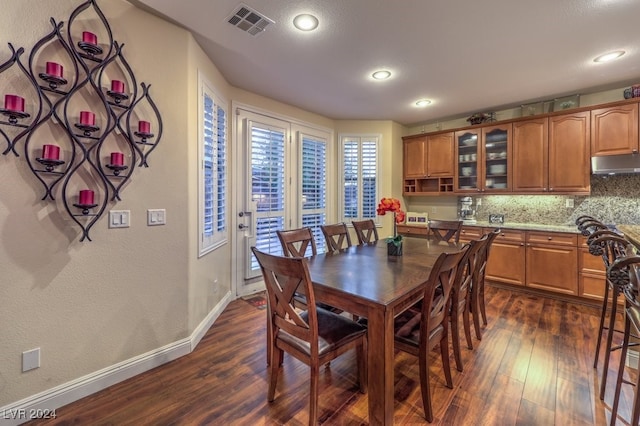 dining room featuring dark hardwood / wood-style floors