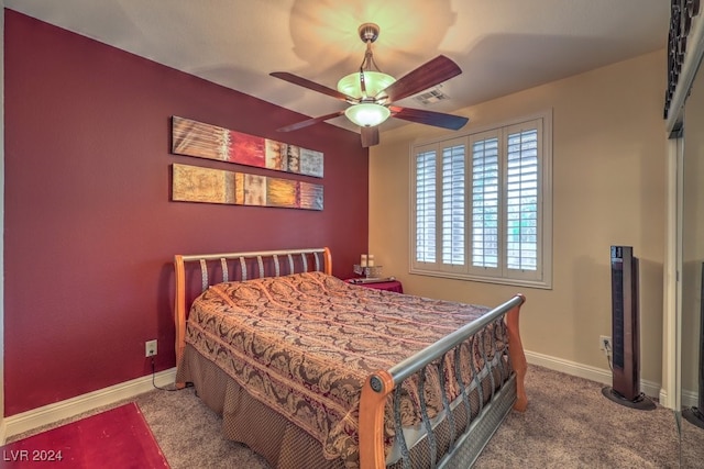 bedroom featuring ceiling fan and carpet flooring