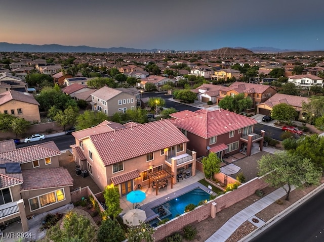 aerial view with a mountain view and a residential view