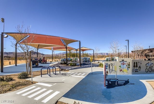 surrounding community featuring a mountain view