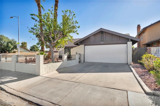 ranch-style home with a garage