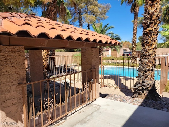 view of patio with a community pool