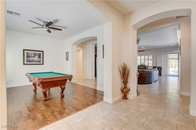 rec room with ceiling fan, billiards, and light hardwood / wood-style flooring