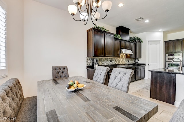 dining room with an inviting chandelier