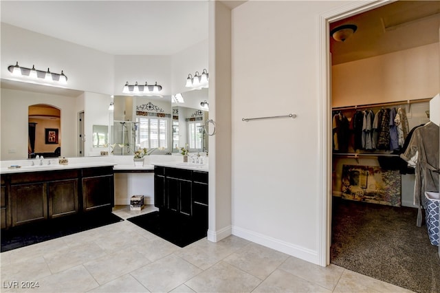 bathroom featuring tile patterned floors and vanity