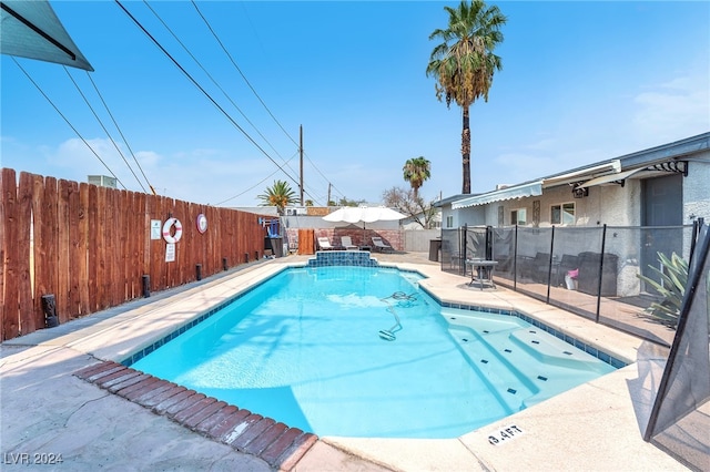 view of pool with a patio area