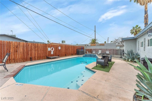 view of pool with a fenced backyard, a fenced in pool, and a patio