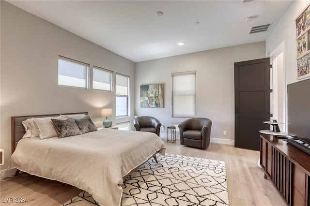 bedroom featuring light hardwood / wood-style floors