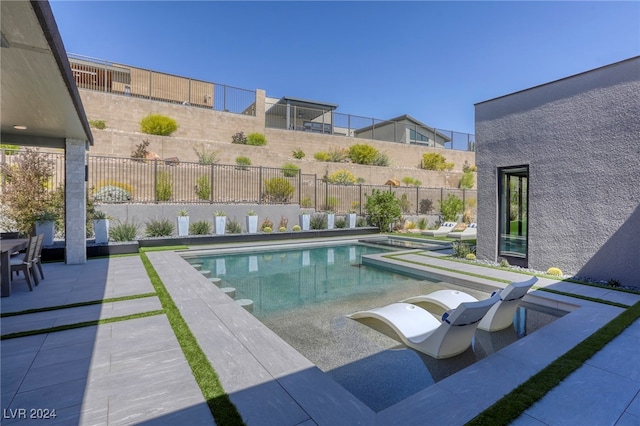 view of pool with a patio