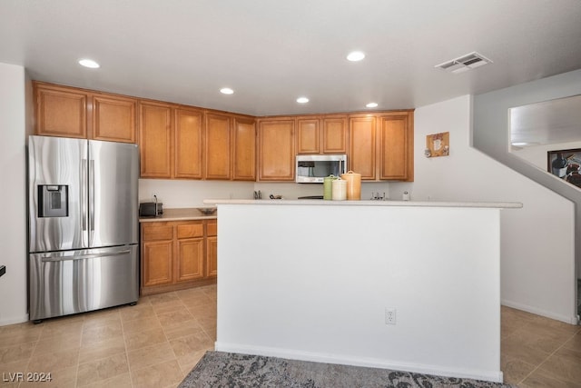 kitchen featuring appliances with stainless steel finishes